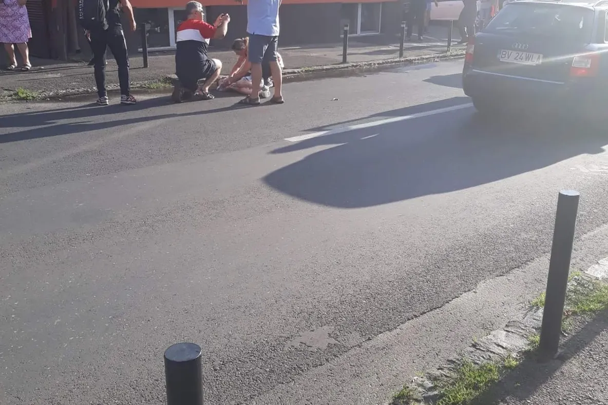 Copil inconştient, lovit de maşină