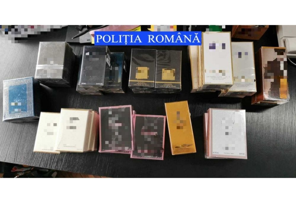 Zeci de parfumuri FAKE, confiscate de polițiști! De unde erau comercianții