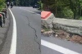 Zid de sprijin surpat pe drumul spre Poiana Braşov, după ploile abundente. Circulaţia se desfăşoară alternativ