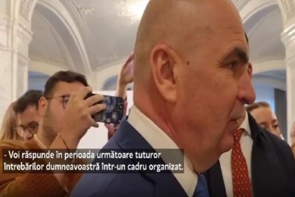 BOLOJAN FUGE DE ÎNTREBĂRILE JURNALIȘTILOR